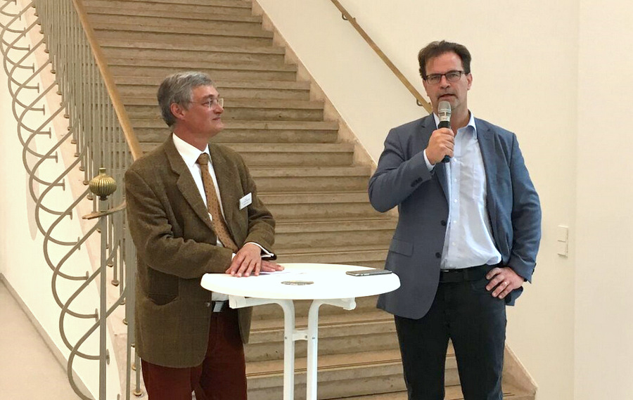 Dr. Wouters und C. Krügel beim Impulsreferat